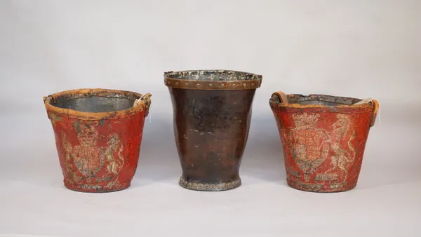 A pair of 19th century leather fire buckets each painted with the British standards against a red ground, 23cm high and one further leather and brass