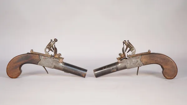 A pair of flintlock pocket pistols, 19th century, engraved 'BURY' to the steel lockplates, each with a twist-off barrel, 5cm and one piece walnut hand