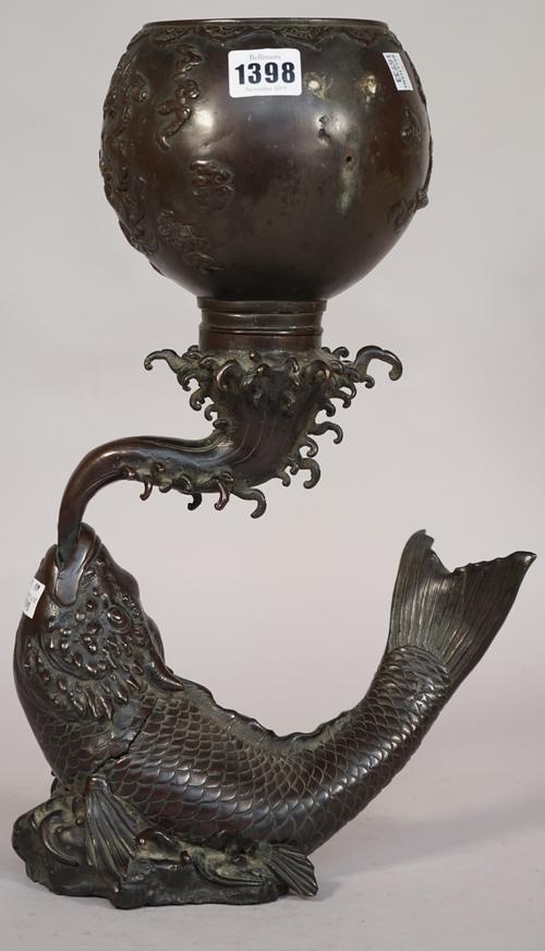 A Chinese bronze vase on stand, 20th century, the globular bowl relief cast, with dragons supporting a water fountain and koi carp base, (a.f.), 39cm