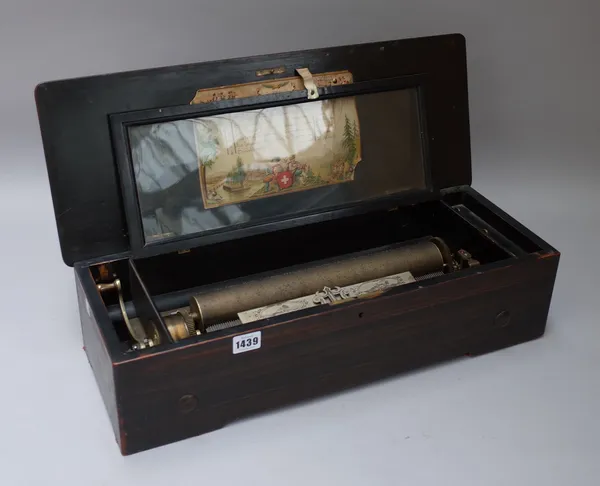 A Swiss walnut cased cylinder music box, late 19th century , the marquetry inlaid case enclosing a 13 inch cylinder, with change and stop/repeat lever