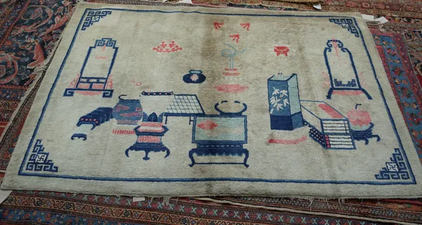 A Chinese pictorial rug, the fawn field with an interior room design in indigo corner design, 132cm x 205cm.