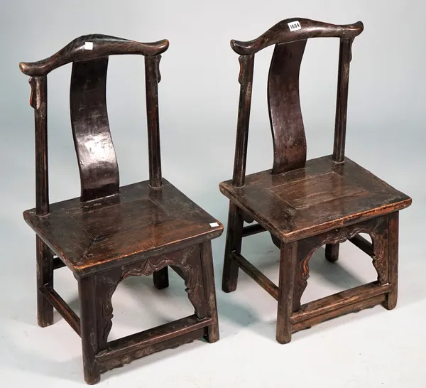 A pair of 19th century Chinese child's yoke back chairs, on turned supports, 38cm wide x 73cm high.