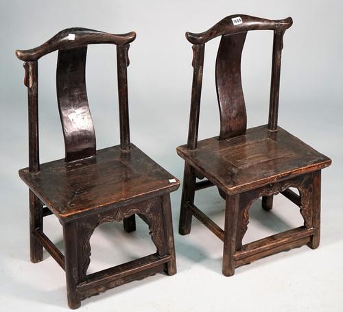 A pair of 19th century Chinese child's yoke back chairs, on turned supports, 38cm wide x 73cm high.