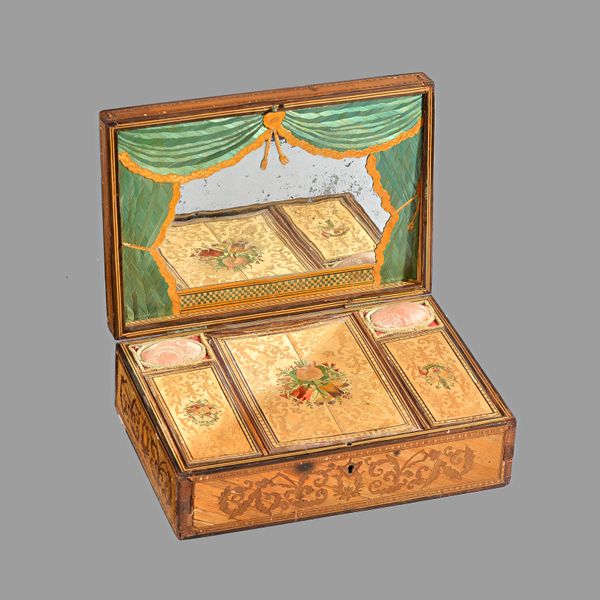 A Napoleonic prisoner of war straw work box, the hinged rectangular top depicting a port scene opening to reveal a fitted interior, 28cm wide x 9cm hi