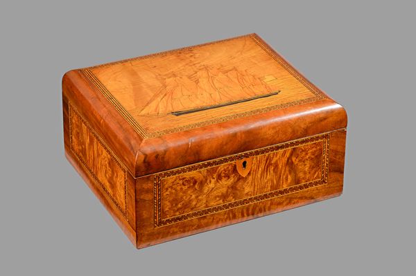 A late 19th century feather banded walnut box, the rectangular lid inlaid with a triple masted spice clipper ship at full sail, 31cm wide x 15cm high.