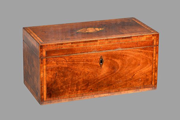 A George III mahogany tea caddy, the rectangular conch shell inlaid top enclosing a twin lidded interior centred by mixing bowl, 32cm wide x 16cm high