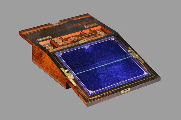 A Victorian burr-thuya wood slope front writing box with gilt metal mounted coromandel lined interior, 35cm wide x 11cm high. Illustrated