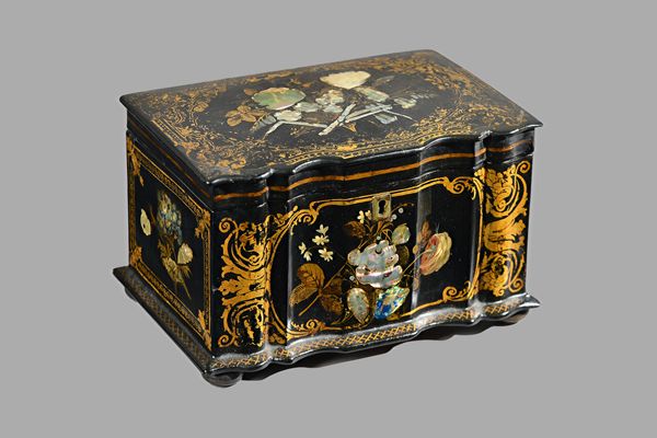 A Regency mother-of-pearl painted parcel gilt papier mâché tea caddy, the shaped rectangular top enclosing a twin lidded interior, 20cm wide x 12cm hi