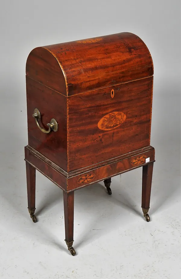 A George III inlaid mahogany dome top cellarette on tapering square supports, 38cm wide x 70cm high.