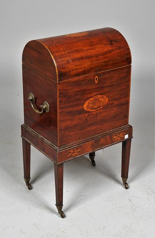 A George III inlaid mahogany dome top cellarette on tapering square supports, 38cm wide x 70cm high.