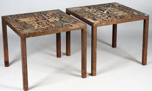 A pair of modern side tables, each with square tops inlaid with type face printing blocks on box tube metal base, 62cm wide x 53cm high, (2).