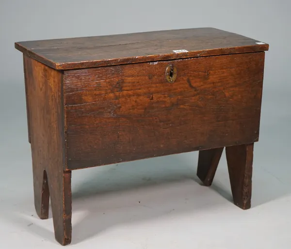 A small 17th century oak five plank coffer, on slab end supports, 54cm wide x 44cm high.