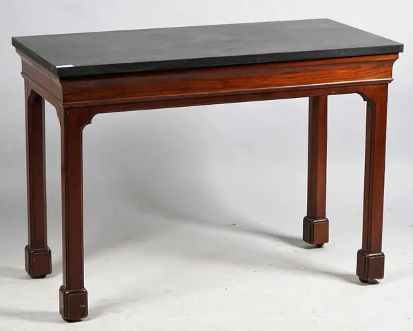 A console table, the rectangular black marble top on a mid-18th century design mahogany base of four canted square supports, 118cm wide x 84cm.