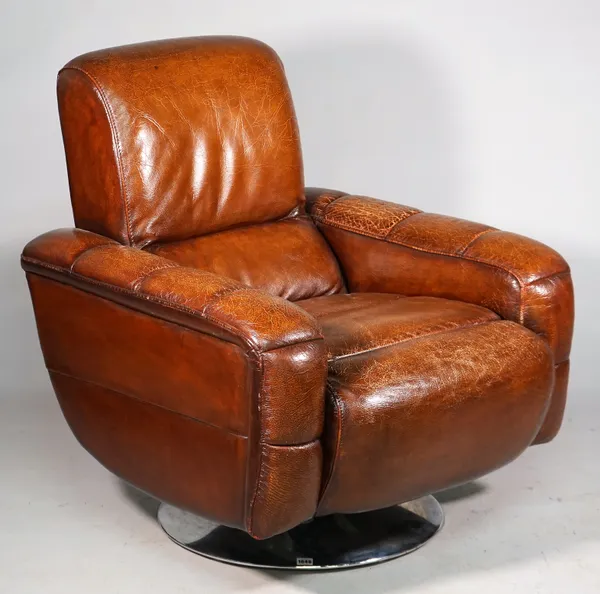 A modern brown leather upholstered swivel easy armchair on splayed polished metal base, 90cm wide x 96cm high.