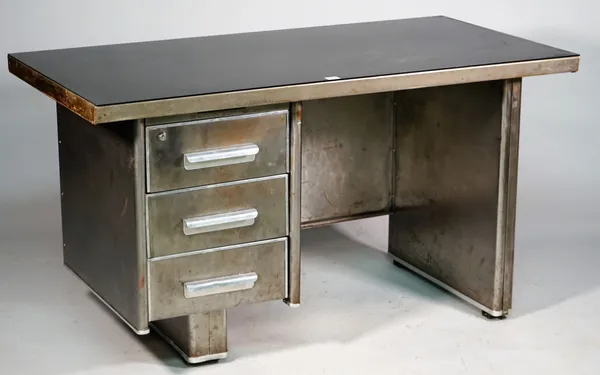 Industrial Design; a smoked perspex top office desk with polished steel base and three pedestal drawers, 130cm wide x 65cm deep.