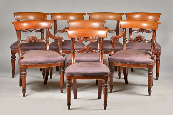 A set of eight William IV mahogany dining chairs with concave crest rail, acanthus waist and bow seat on tapering turned supports, 50cm wide x 87cm hi