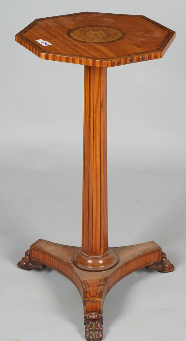 A marquetry inlaid satinwood occasional table, the octagonal top on associated Regency base with hexagonal column and three paw feet, 38cm diameter x