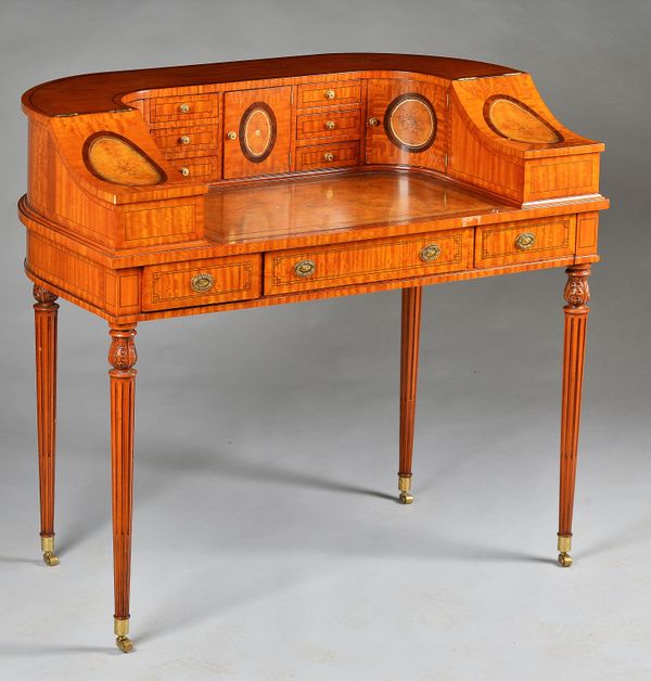 Maitland-Smith; an inlaid satinwood Carlton House desk with fitted superstructure over three frieze drawers on tapering fluted supports, 110cm wide x