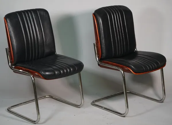 Gordon Russell for Giroflex; a pair of mid-20th century laminated teak and black leather boardroom chairs on tubular chrome supports, 60cm wide x 90cm