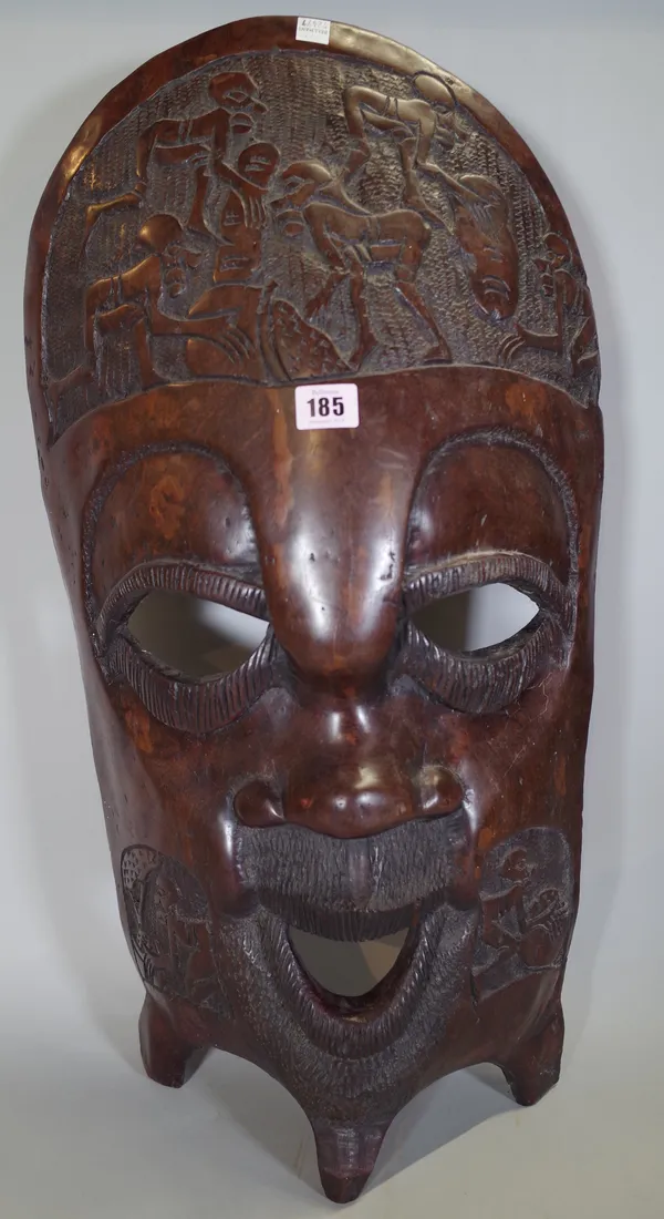 A large mid-20th century African carved hardwood mask.