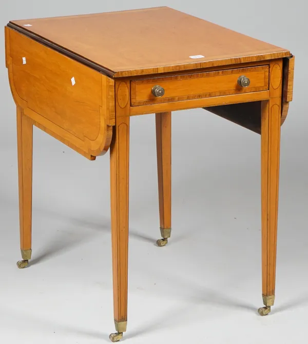 A George III rosewood banded satinwood Pembroke table, with single frieze drawer and dummy verso, on tapering square supports, 67cm wide x 69cm high.