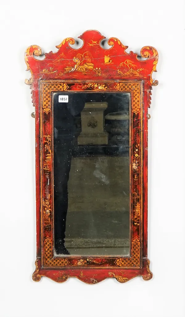 A George II style red lacquer fret cut wall mirror, 45cm wide x 87cm high.