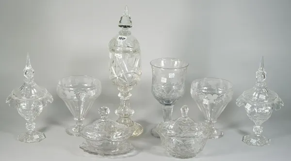 A group of cut glass, early 19th and later, comprising; an oval bowl, cover and stand; an oval bowl and cover; a tall continental goblet and cover, 47