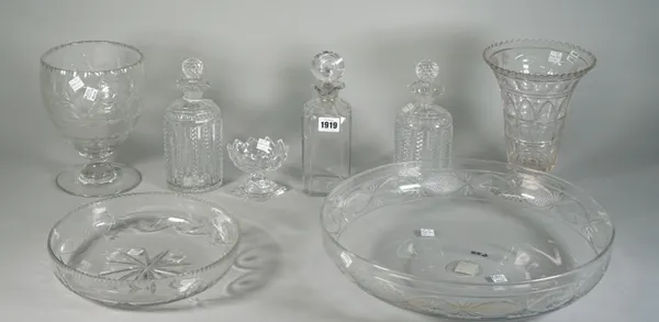 A group of glassware, early 19th century and later, comprising; a pair of cut glass spirit decanters and stoppers, 22cm high; a plain spirit decanter