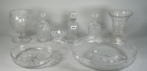 A group of glassware, early 19th century and later, comprising; a pair of cut glass spirit decanters and stoppers, 22cm high; a plain spirit decanter