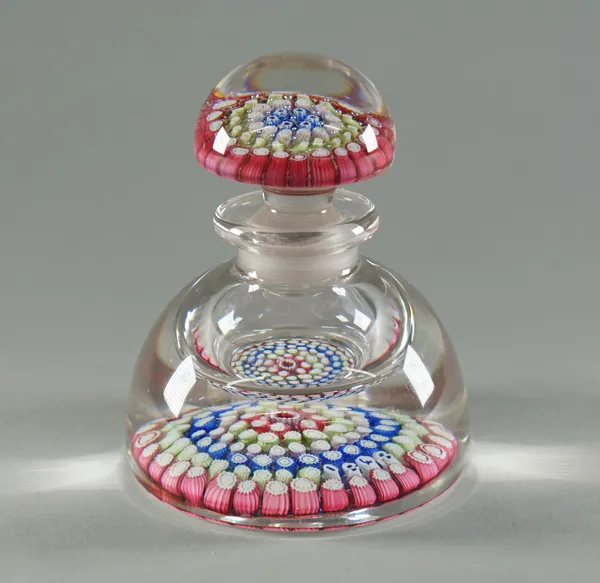 A millefiori glass paperweight inkwell, probably Whitefriars, 20th century, concentric canes incorporating the date '1848', 14.5cm high.