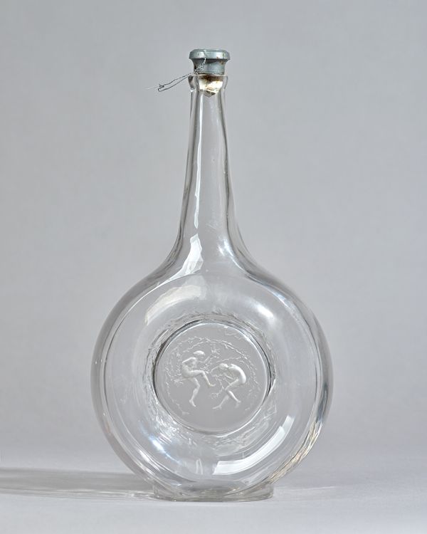 Rene Lalique; a Deux Danseuses carafe, No 3153, designed 1912, etched mark to base 'R Lalique France No 3153', 34cm high. Illustrated