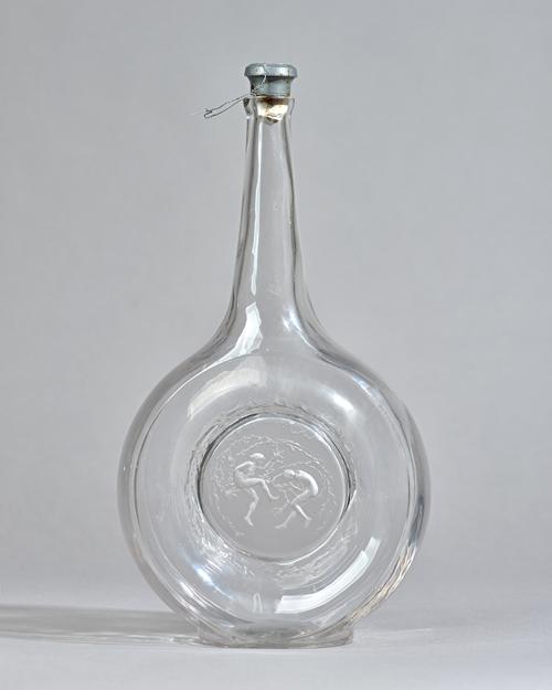 Rene Lalique; a Deux Danseuses carafe, No 3153, designed 1912, etched mark to base 'R Lalique France No 3153', 34cm high. Illustrated