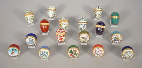 Seventeen miniature Halcyon Days enamel eggs and trinket boxes, 3.3cm, (17).