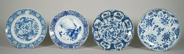 Four Chinese blue and white plates, 18th century, one painted with a hunting scene, another with phoenix and two painted with flowers, hunting plate w