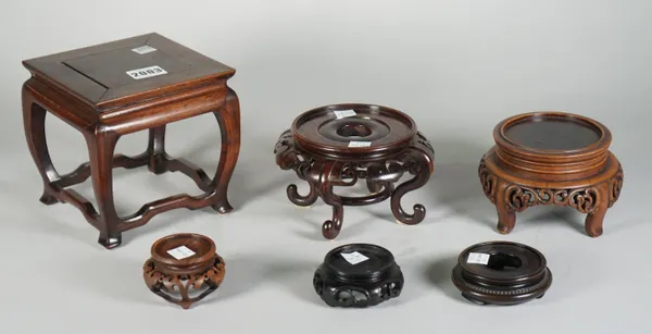 A group of six Chinese hardwood stands, 2.5cm to 14cm high, (6).