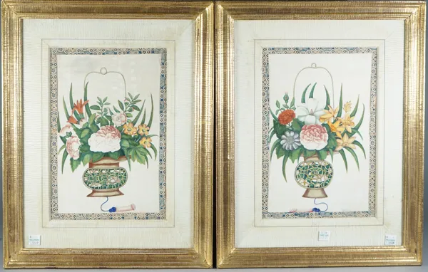 A pair of Chinese paintings on rice paper, 19th century, each painted with a basket of flowers, 26cm by 16.5cm, mounted, framed and glazed, (2).