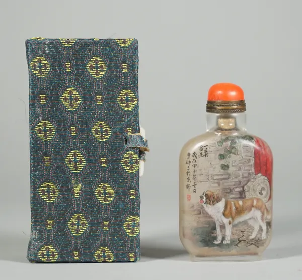 A Chinese inside painted glass snuff bottle, 20th century, painted on one side with a St.Bernard against a wall beside rows of calligraphy, 6.25cm hig