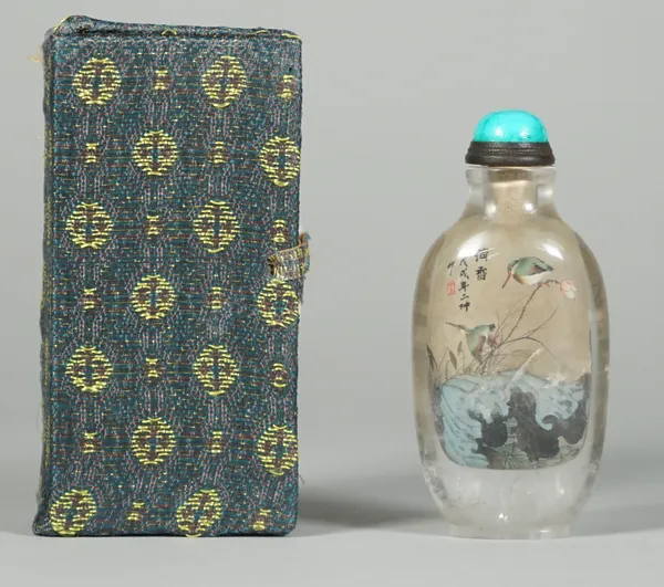 A Chinese inside painted rock crystal snuff bottle, 20th century, each side painted with birds and flowers, signed, 7cm high, cased.