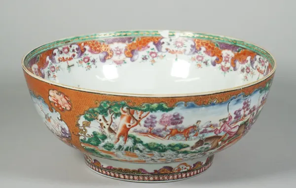 A Chinese export famille-rose hunting punch bowl, Qianlong, painted with large panels of European equestrian huntsmen and hounds in pursuit of a hare