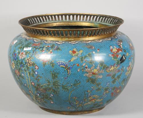 A large Chinese cloisonné jardiniere, early 19th century, of circular form with pierced gilt-metal rim, worked with birds and insects amongst flowerin