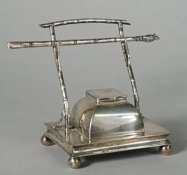 A Chinese export silver inkstand and pen, attributed to the firm of Hung Chong, late 19th/early 20th century, the stand of rectangular form set on fou