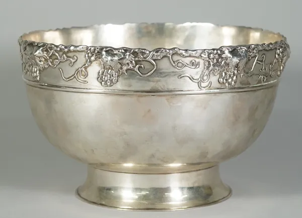 A Chinese export silver bowl, mark of Zeewo, 20th century, of circular form on waisted foot, the border applied with fruiting vine and tendrils, marke