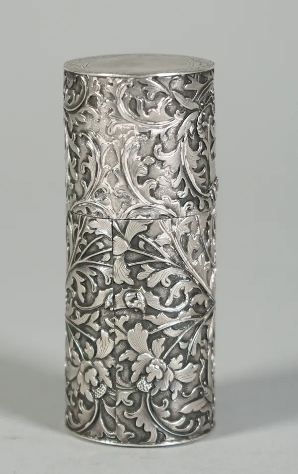 A Chinese export silver container and cover, mark of Leeching, late 19th century, of cylindrical form, decorated in repoussé with bats and insects amo