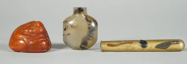 A Chinese agate snuff bottle, 19th/20th century, flattened circular form, in smokey coloured tone with dark brown inclusions, 4.25cm. high; also a Jap
