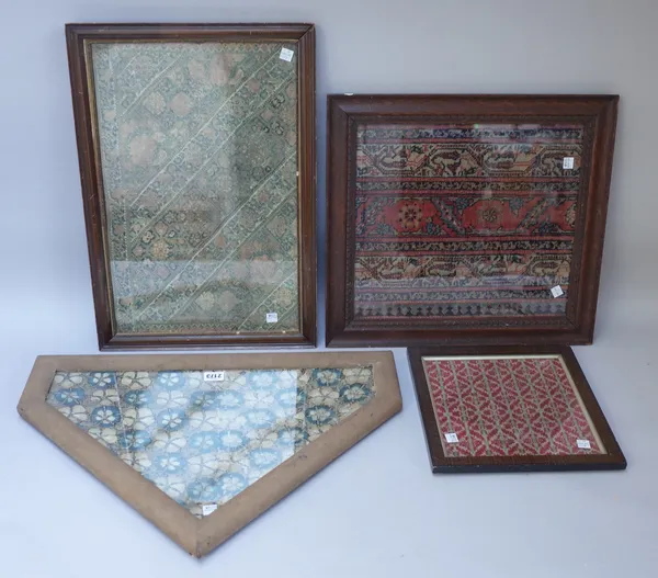A group of four Asian textiles, including; a section from a Feraghan rug, two embroidered panels, and a smaller square panel with rows of red and gree