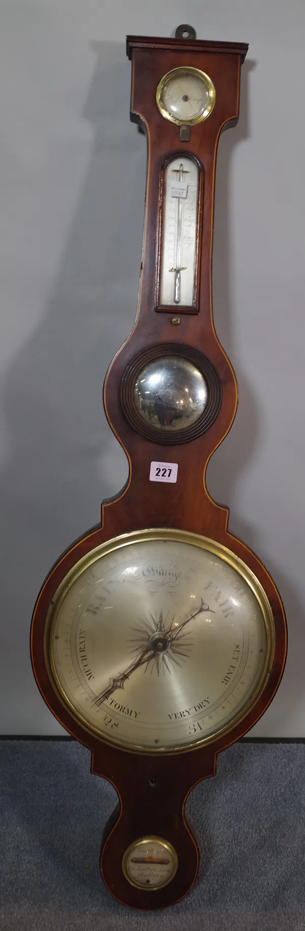 A 19th century mahogany and line inlaid wheel barometer.