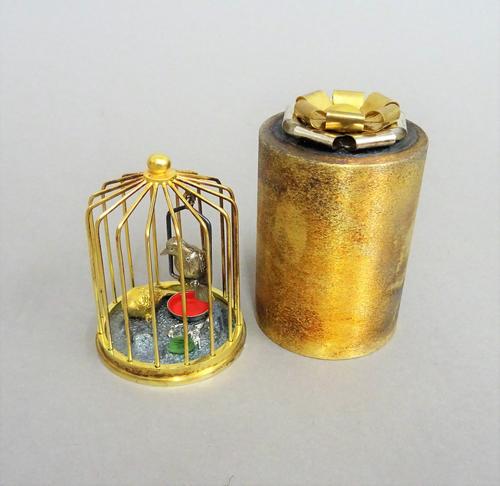 A Stuart Devlin Christmas box, containing a silver gilt and enamelled model representing the second day of Christmas, being Two Turtle Doves, numbered