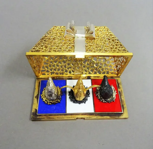 A Stuart Devlin Christmas box, containing a silver gilt and enamelled model representing the third day of Christmas, being Three French Hens, numbered