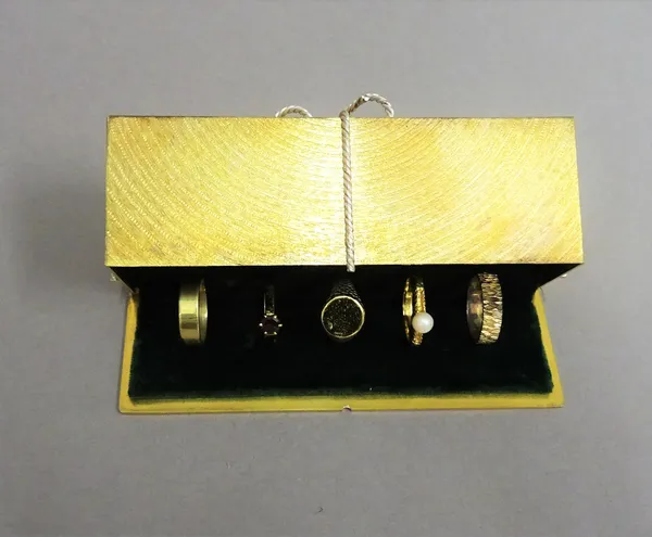 A Stuart Devlin Christmas box, containing a silver and silver gilt and gem mounted model representing the fifth day of Christmas, being Five Gold Ring
