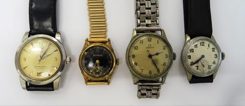 An Omega M.O.D issue base metal cased gentleman's wristwatch, the caseback detailed A.M 6B/159 3941/42, on a steel bracelet, an Omega Seamaster Calend